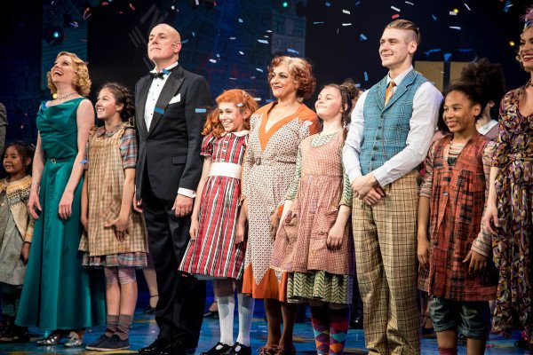 Meera Syal (Miss Hannigan) and the West End cast of Annie at the Piccadilly Theatre
