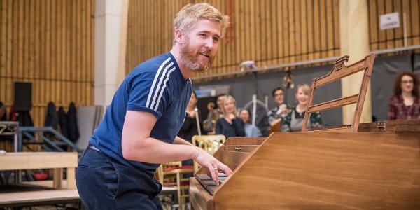 Adem Gillen (Wolfgang Mozart) in rehearsal for Amadeus at the National Theatre (Photo: Marc Brenner)