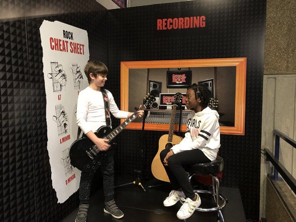 Nerys and Jack in the New London Theatre's Gibson Guitar Area