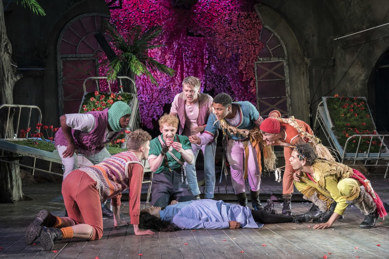 Sam Angell as Peter with the Lost Boys and Wendy - Photo Johan Persson