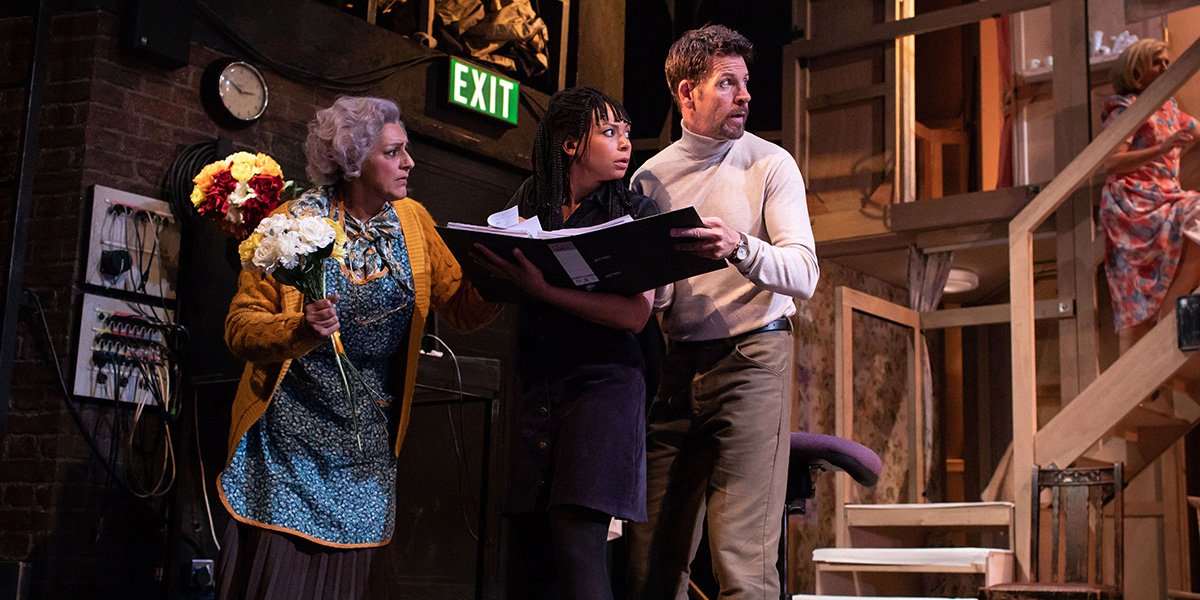 Meera Syal (Dotty Otley), Lois Chimimba (Poppy Norton Taylor), Lloyd Owen (Lloyd Dallas) in Noises Off. Photo Credit Helen Maybanks