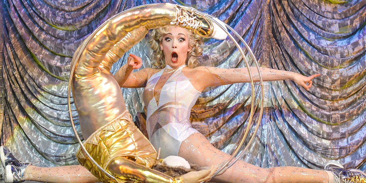 Bryony Corrigan as Spitzmaus in Magic Goes Wrong. Photo by Robert Day.