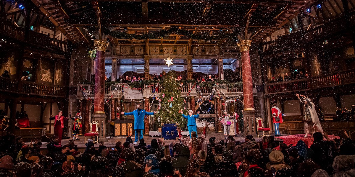 Full cast in Christmas At The (Snow) Globe. Photo by Tristram Kenton.
