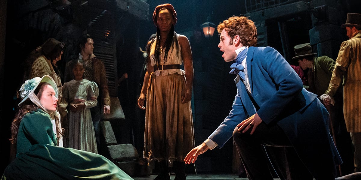 Lily Kerhoas as Cosette, Harry Apps as Marius and Shan Ako as Eponinein in Les Mis. Photo by Michael Le Poer Trench.