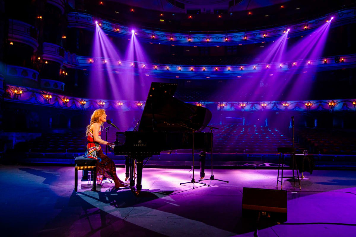 Cassidy Janson performing on a piano.