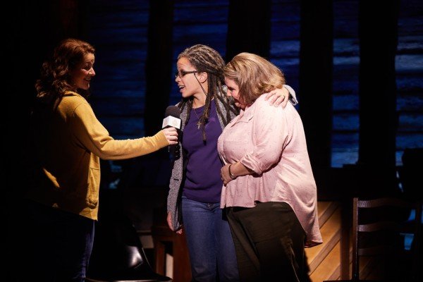 Jenna Boyd and Cat Simmons cuddle in Come From Away 