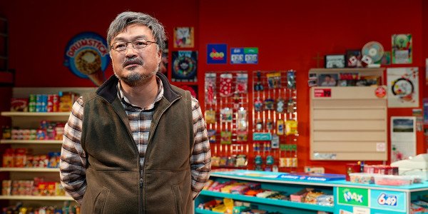 Ins Choi (Appa) standing in the store.